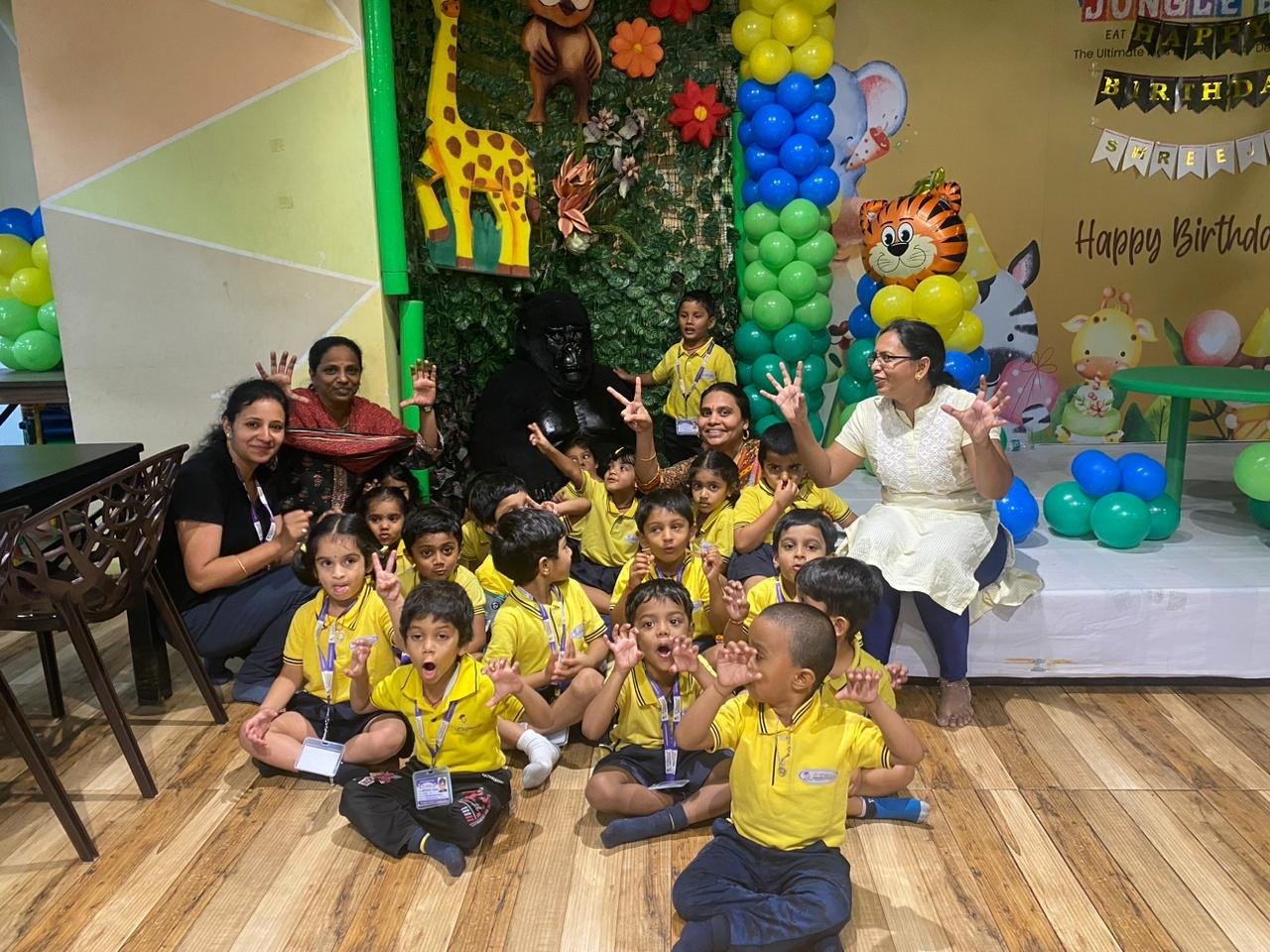 Elegancia students and teachers enjoying a joyful group activity